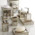 Beautifully coordinated set of bath accessories. The mirrored panels and  vintage look make for the