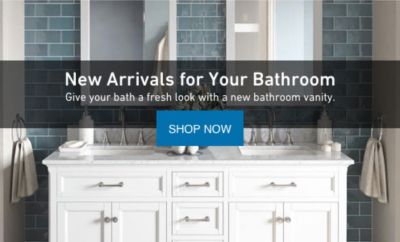 Light gray double sink vanity with 2 cabinets and 4 drawers with white  marble countertops.