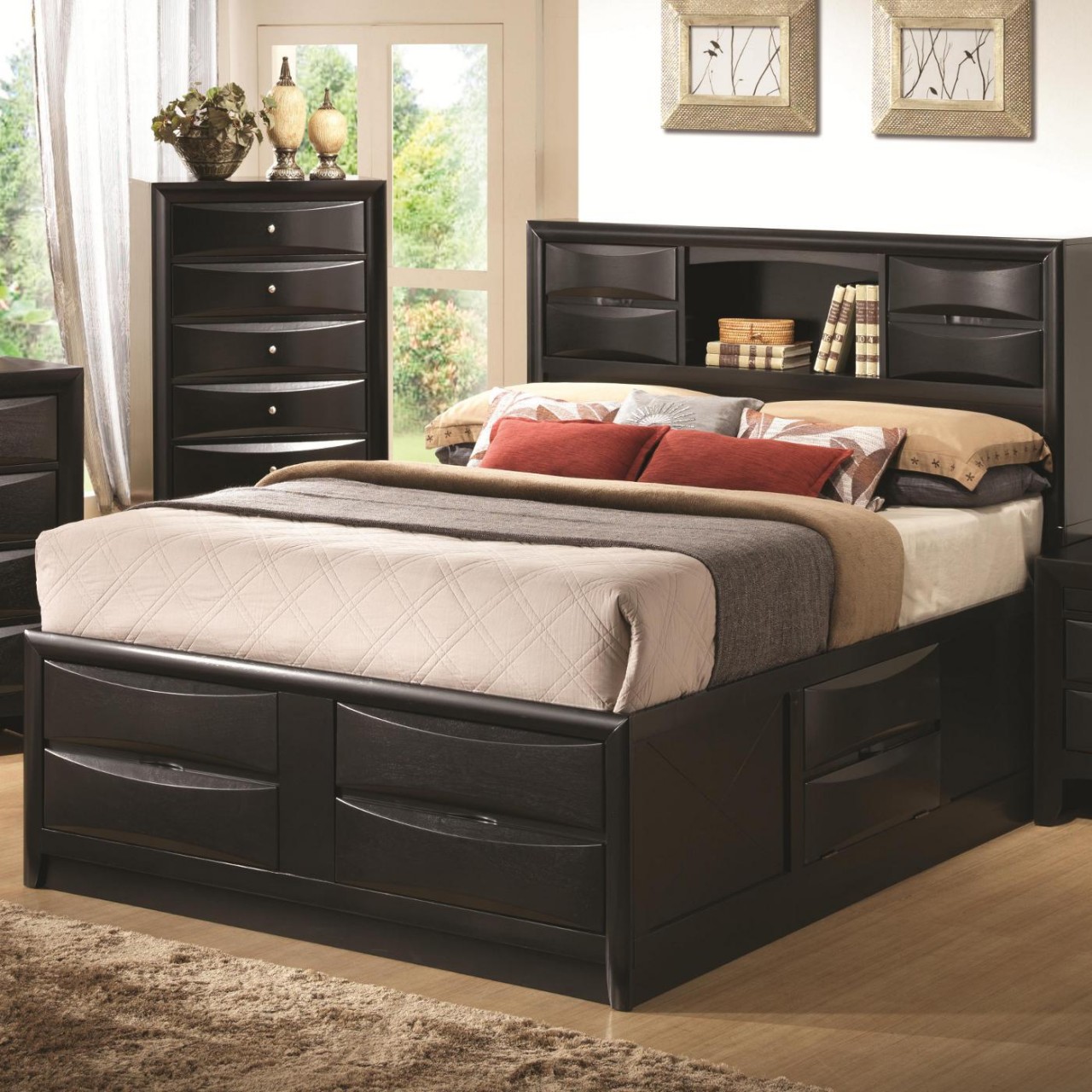 Black painted wooden bed frame with storage underneath and shelf plus a  pair of cabinets in