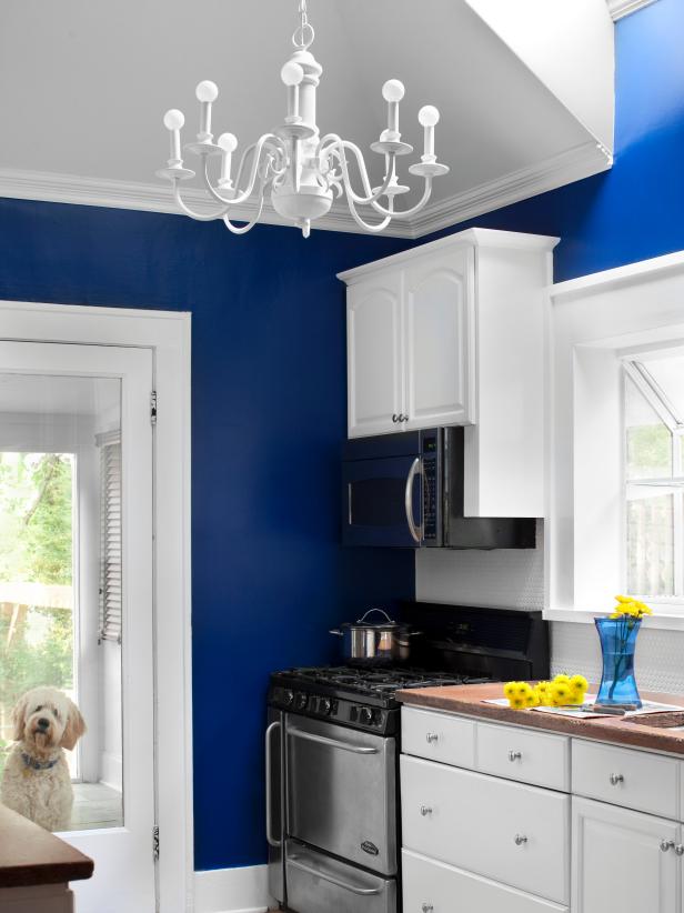 White Kitchen With Bright Blue Walls