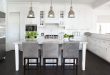 View in gallery Benson pendant lights bring an antique touch to this modern  white kitchen