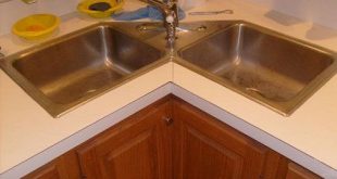 Give luxurious designs to modular kitchen with corner kitchen sink cabinet