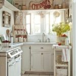 White cottage shabby chic kitchen with pops of red [Design: Sunday  Henrickson for Tumbleweed & Dandelion]. Amy Muse · Small Country Kitchen  Ideas