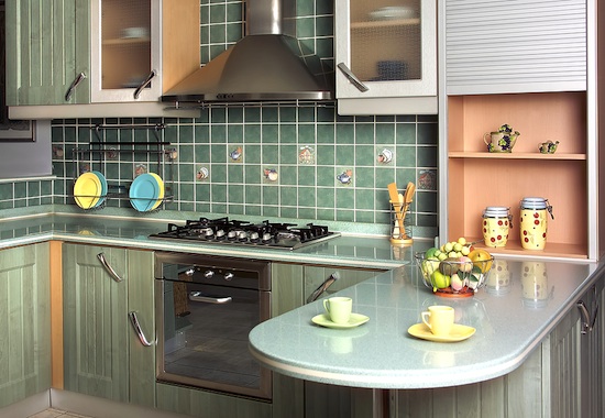 green ceramic tile backsplash