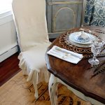 White Slipcovered Chair in Country Dining Room