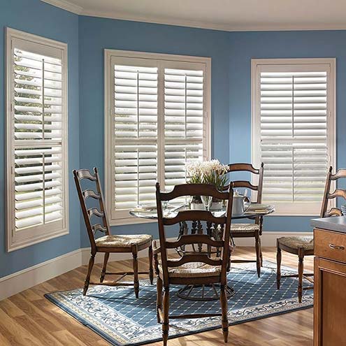 Home window designs using faux wood  plantation shutters