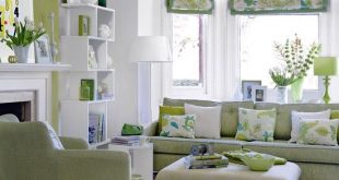 green living room design: good example of Chromatic Distribution, with  largest areas in neutral white, and smaller accents in bold green.