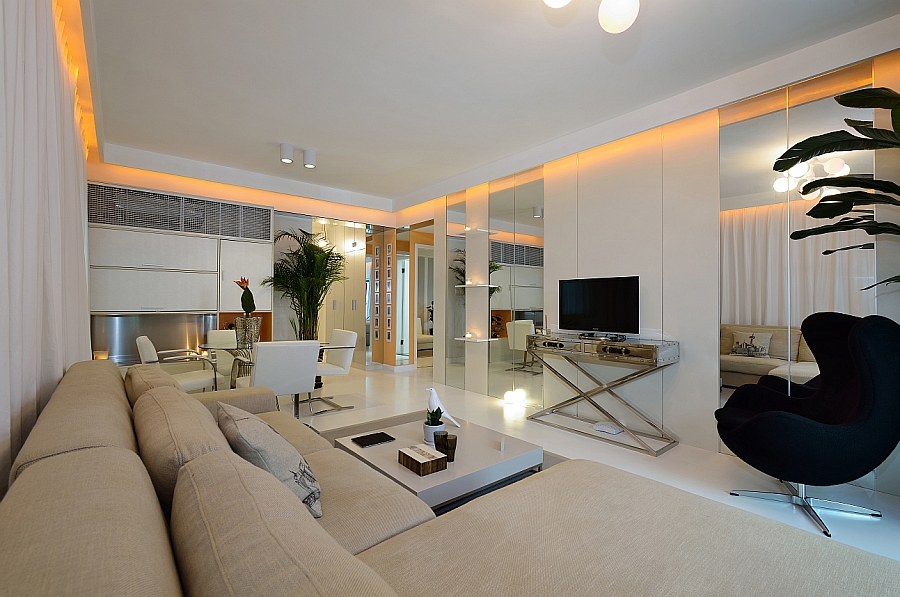 View in gallery Iconic decor and a neutral color palette in the living room  of the Shanghai apartment