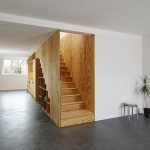 Eclépens apartment interiors with boxy wooden furniture by Big-Game