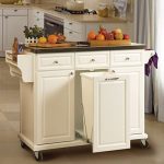 White Kitchen Cart With Trash Pull $279.99. Use for my folding center/extra  storage in the bathroom. Pull out as a hamper.