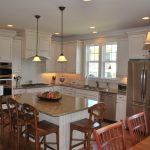 Retro White Kitchen Design Ideas with 4 Wooden Seating Kitchen Island Set,  Brown Granite Kitchen