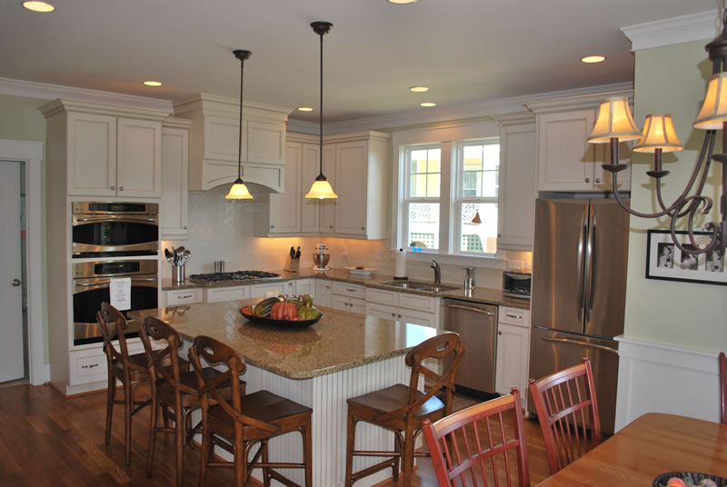 Retro White Kitchen Design Ideas with 4 Wooden Seating Kitchen Island Set,  Brown Granite Kitchen