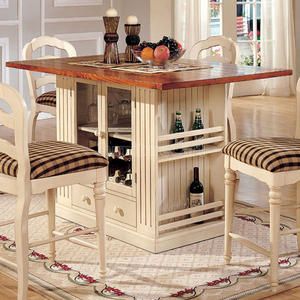 A storage kitchen island and dining table in one with a beautiful white  painted finish! Make this from an old cabinet and use as dining table in  kitchen?