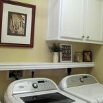 Laundry room ideas - cabinet, shelf, and hanging rod. I like this b