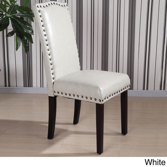 Antique style furnishing with
  leather  dining chairs with nailheads