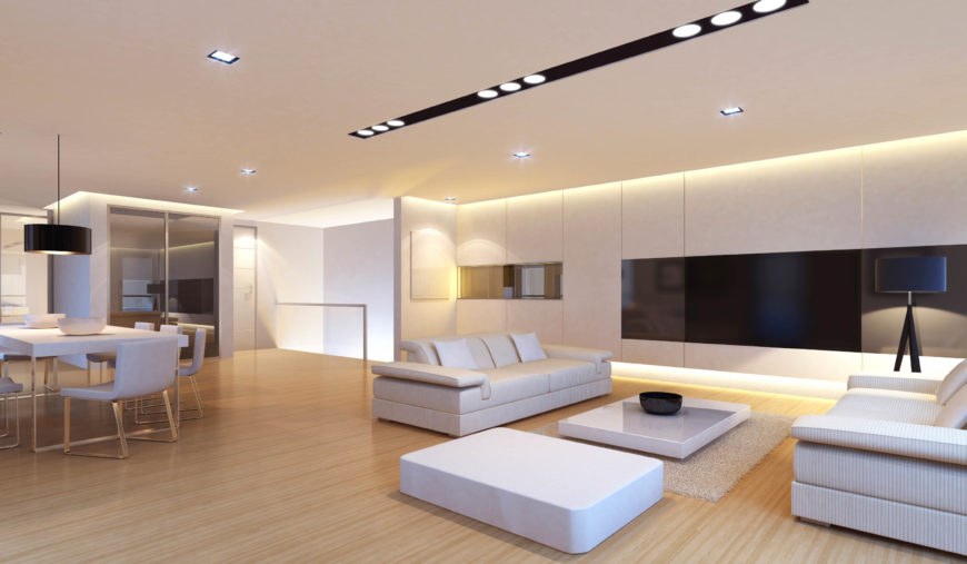 Here is a bright and simple modern living room that uses a number of simple  recessed