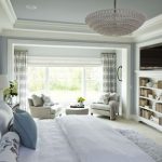 Huge elegant master carpeted bedroom photo in Minneapolis with blue walls