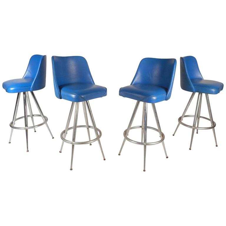 Set of Four Mid-Century Modern Swivel Bar Stools by L & B Products  Corporation