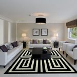 View in gallery Captivating rug ensures that this cool living room has a  striking centerpiece