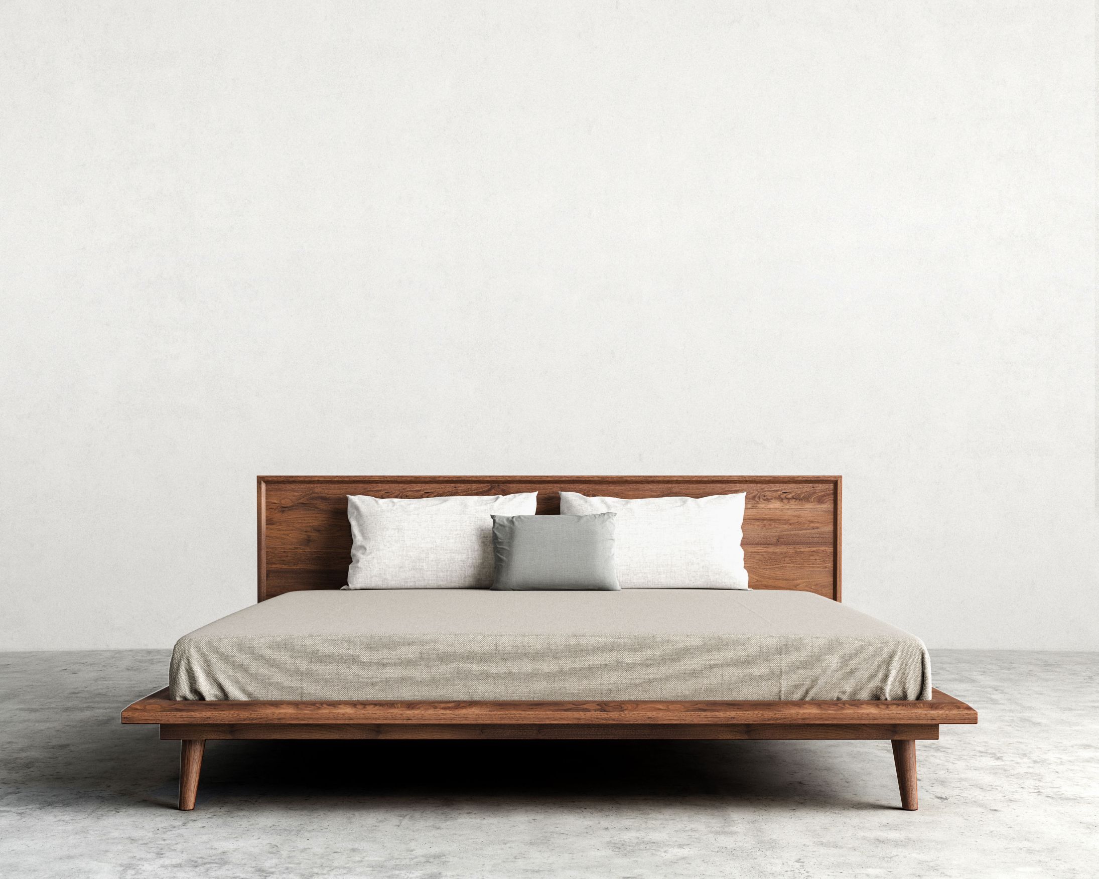 Asher is a mid-century modern inspired bed with tapered legs and beautiful  dark-stained walnut veneer, available in Queen or King.