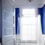 Royal Blue Bathroom With White Slipper Tub