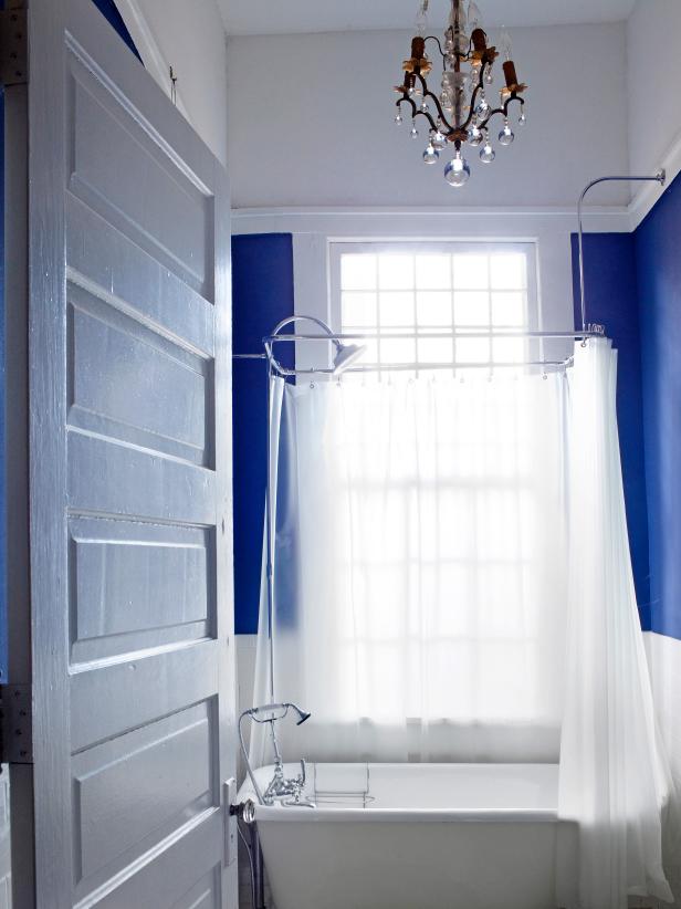 Royal Blue Bathroom With White Slipper Tub