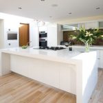 Plank white oak wood floor with a white-washed finishing technique