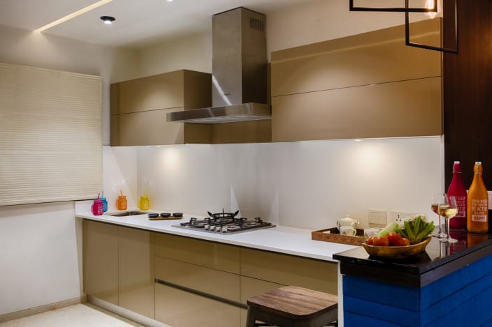 Beige Cabinets And Modern Interior of Parallel Kitchen with White Counter  Top