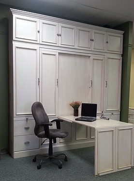 Murphy bed shown with the desk folded out.
