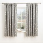 Stylish pencil pleat curtains with a star design in a satin and matt