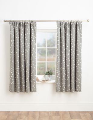 Stylish pencil pleat curtains with a star design in a satin and matt