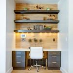 Small trendy built-in desk medium tone wood floor study room photo in Salt  Lake