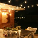 A patio with outdoor string lights is the perfect spot for a romantic night  in