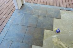 Young House Love--tile back patio over concrete