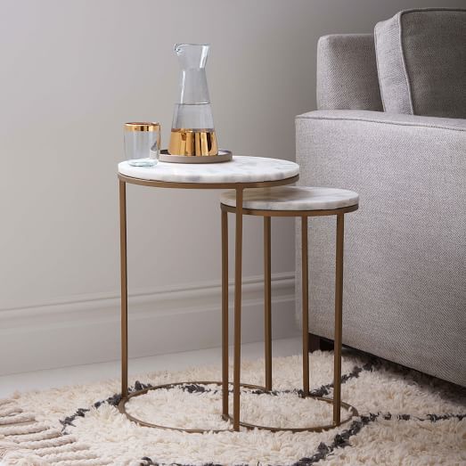 Accessorize your home with round
  nesting  tables marble top