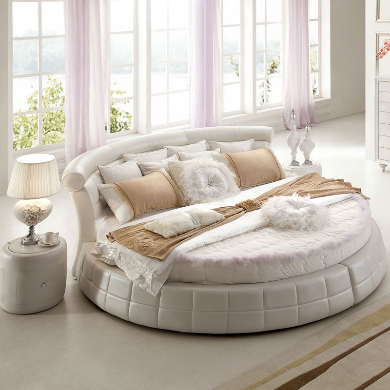 Round shaped king size bed helping
  in  decorating your bedroom