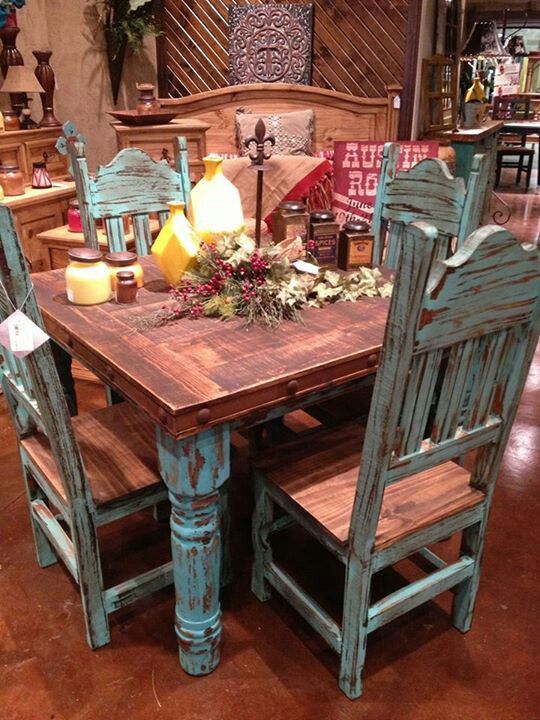 Love the rustic turquoise table