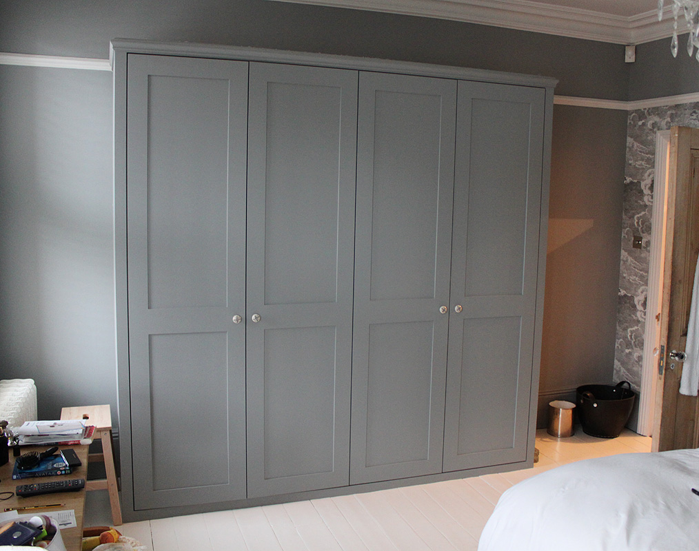 Beautiful grey shaker doors closed on bedroom wardrobe