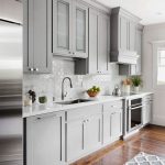 Backsplash Light grey Shaker style kitchen cabinet painted in Benjamin  Moore 1475 Graystone. The walls are Benjamin Moore Dove Wing.