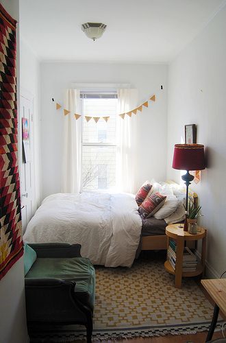 The bed is all cute and tucked away over there :) | Good idea for small  bedrooms