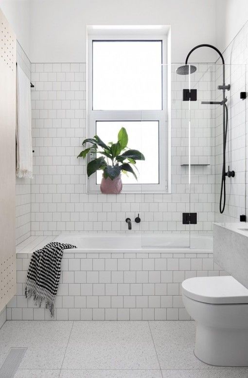 How to make small bathroom design with
bathtub and shower look bigger