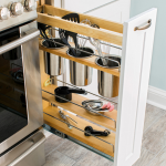 Get the most out of a narrow space with a pull-out cabinet, like this one  from Home Depot.
