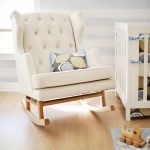 The Nursery Works Empire Rocker has an oversized tufted wing-back frame,  finely upholstered in a durable blend of polyester, linen and viscose.