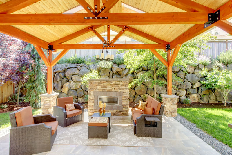 comfortable pavilion for outdoor with fabricated vinyl flooring an outdoor  fireplace with natural stone-looks