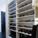 Full view of closet hutch custom walk-in closet shoe shelves