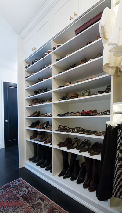 Full view of closet hutch custom walk-in closet shoe shelves