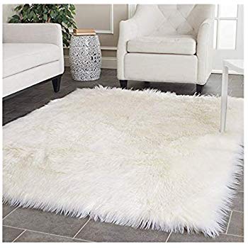 White fur shag rug gives a luxurious look
  in the room