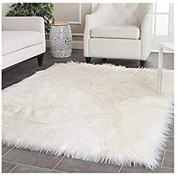 White fur shag rug gives a luxurious
  look  in the room