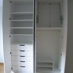Furniture. white wooden wardrobe five drawers and racks also racks plus  four doors. Amazing