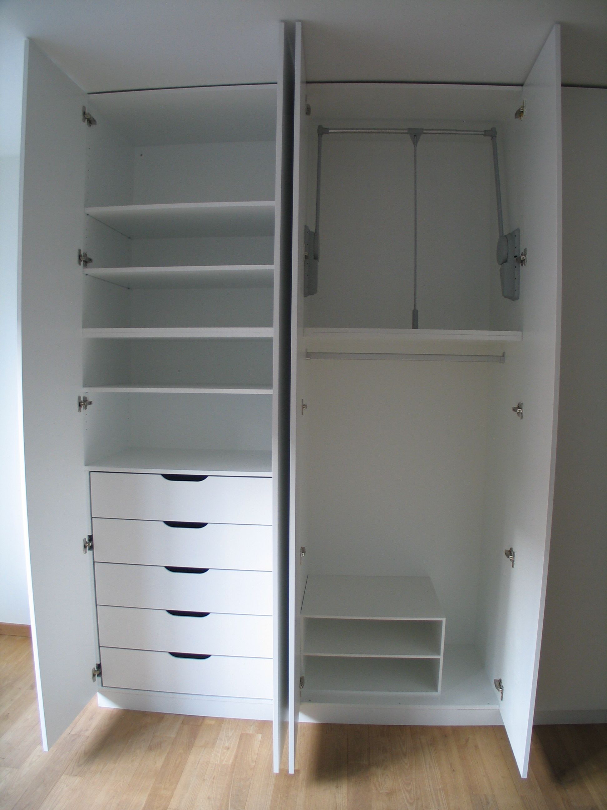 Furniture. white wooden wardrobe five drawers and racks also racks plus  four doors. Amazing